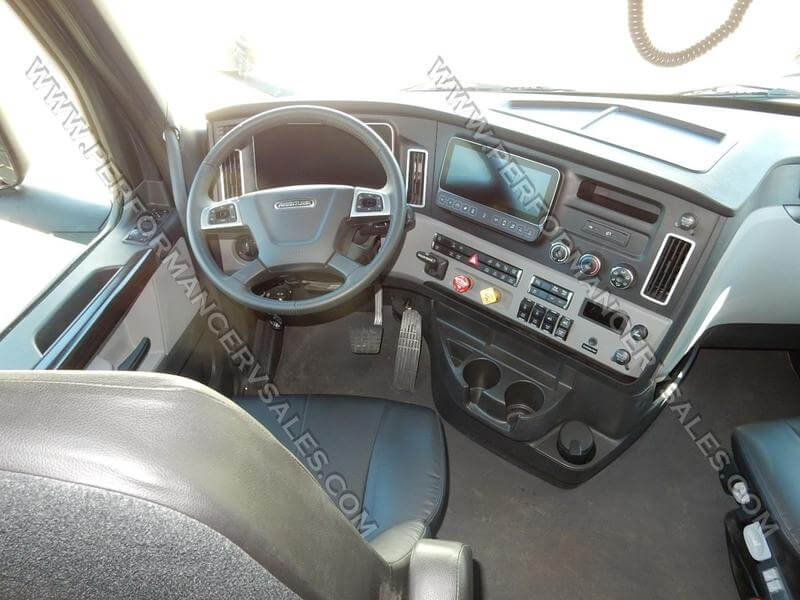 2022 Showhauler Motorhome Conversion 35QQSSL driver's area