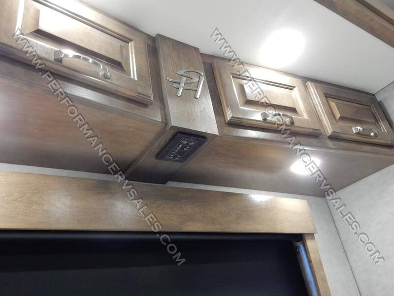 2022 Showhauler Motorhome Conversion 35QQSSL master bedroom overhead storage